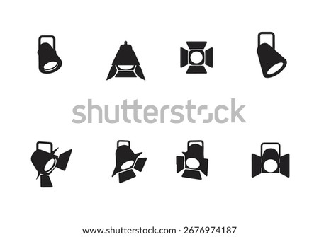 Black and white vector icon set featuring various studio lights, stage spotlights, and photography lighting equipment for entertainment and production design.