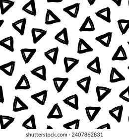 A black and white vector pattern with random, grungy, hand-drawn brushstroke triangles. Ideal for wrapping paper, banners, cards, posters, textiles, and more. A trendy and dynamic design