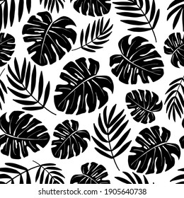 Black and white vector pattern from various leaves of tropical plants. For summer beach decor, textile printing and stationery.