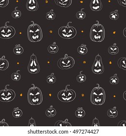 Black and white vector seamless pattern for Halloween with carved pumpkins