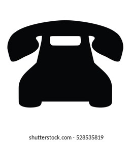 A black and white vector silhouette of a rotary phone