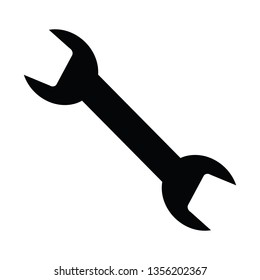 A black and white vector silhouette of a spanner
