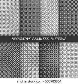 Black and white vertical seamless line patterns set, monochrome geometric texture. Decorative seamless backgrounds, tribal ethnic ornament