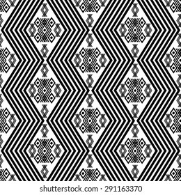 Black and white vertical tribal seamless pattern. Aztec geometric print. Ethnic hipster backdrop. Abstract geometric pattern in black and white
