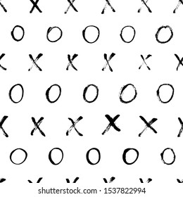 Black and white xo letters vector seamless pattern. Crosses and circles freehand charcoal drawings texture. Monochrome signs painting decorative background. Grunge wallpaper, textile design