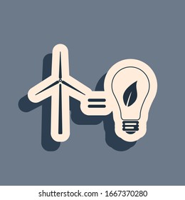 Black Wind turbine and light bulb with leaves as idea of eco-friendly source of energy icon isolated on grey background. Long shadow style. Vector Illustration