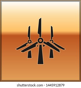 Black Wind turbines icon isolated on gold background. Wind generator sign. Windmill silhouette. Windmills for electric power production. Vector Illustration