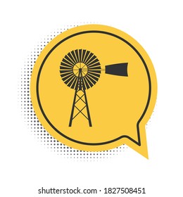 Black Windmill icon isolated on white background. Yellow speech bubble symbol. Vector.