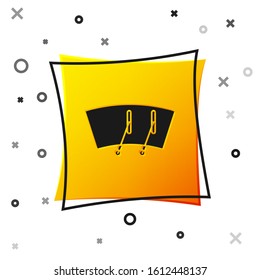 Black Windscreen wiper icon isolated on white background. Yellow square button. Vector Illustration