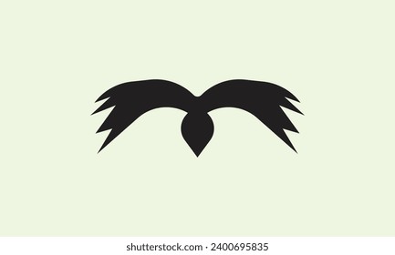 Black wings vector logo icon. Wing badge. Black wing badge. Vector illustration.