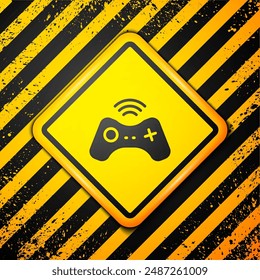 Schwarzes Wireless-Gamepad-Symbol auf gelbem Hintergrund. Gamecontroller Warnschild. Vektorgrafik