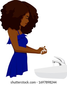 A black woman in a blue blouse washes her hands with soap at a sink.