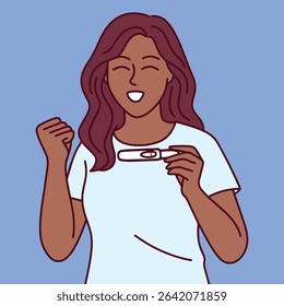 Black woman with curly hair celebrates after receiving a negative pregnancy test. She smiles with relief and raises her fist in joy