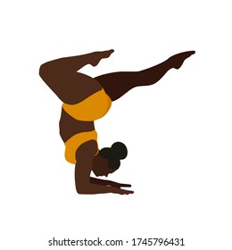 Black woman with orange gym outfit and black hair in a bun in head stand with bent legs yoga pose