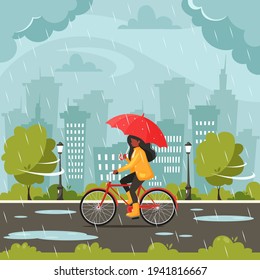 Black Woman Riding Bike Under An Umbrella During The Rain. Fall Rain. Autumn Outdoor Activities. 