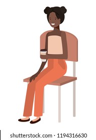 black woman sitting in school chair drinking coffee