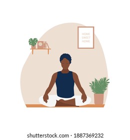 Black woman sitting in sukhasana at home. Young African American female character practicing yoga at home. Healthy lifestyle. Stay fit