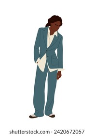 Black woman standing in fashionable casual outfit
