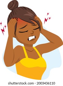 Black woman suffering a terrible headache with hands on head