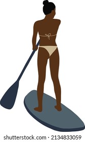 
Black woman in a swimsuit swims on a sup-board with a paddle