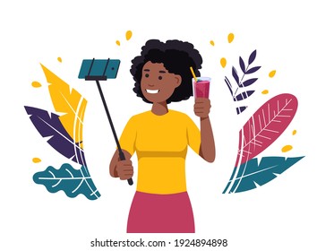 Black woman takes a selfie with a smoothie. Blogger African-american woman