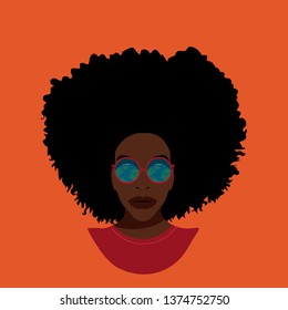 black woman with terrestrial globe reflected in her glasses
