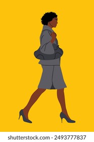 Black woman walking side view. Pretty african american lady in formal office suit with skirt, holding bag. Vector realistic illustration isolated on white background.