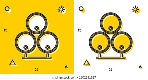 Black Wooden barrels icon isolated on yellow and white background. Alcohol barrel, drink container, wooden keg for beer, whiskey, wine. Random dynamic shapes. Vector Illustration