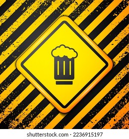 Black Wooden beer mug icon isolated on yellow background. Warning sign. Vector