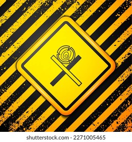 Black Wooden logs on a stand icon isolated on yellow background. Stack of firewood. Warning sign. Vector