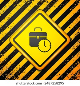 Black Work time icon isolated on yellow background. Office worker. Working hours. Business briefcase. Warning sign. Vector