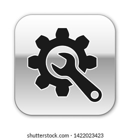 Black Wrench and gear icon isolated on white background. Adjusting, service, setting, maintenance, repair, fixing. Silver square button. Vector Illustration