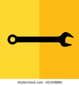 Black wrench tool icon vector illustration. Yellow background