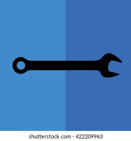 Black wrench tool icon vector illustration. Blue background