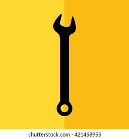 Black wrench tool vector icon illustration. Yellow background