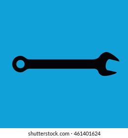 Black wrench tool vector icon. Blue background