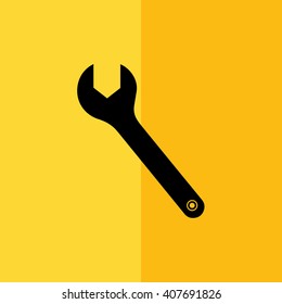 Black wrench tool vector illustration. Yellow background