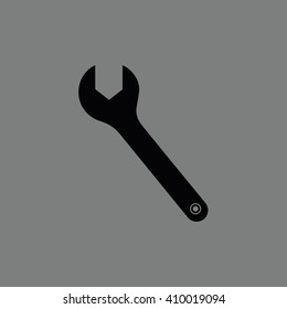 Black wrench tool vector illustration. Gray background