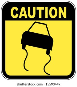 signo de precaución negro y amarillo - resbaladizo de la carretera
