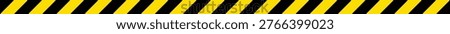 Black and yellow diagonal striped hazard warning tape pattern for industrial construction safety background designs.