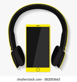 Black and yellow headphones and smartphone