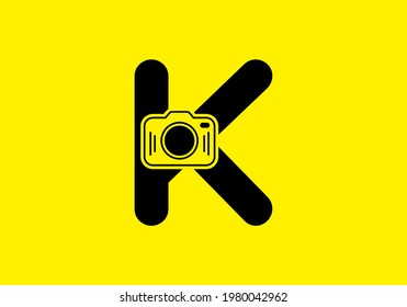 Black yellow of initial K letter with camera design