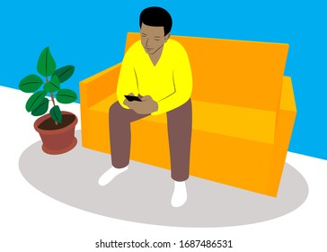 Black Young Man Using Smart Phone While Relaxing Or Working At Home. Downloading App, Surfing Internet On Mobile, Messaging Friends Online And Checking News Feed Via Social Media. African American Guy