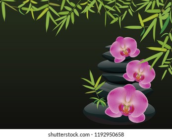 Black zen stones in a pile with orchid flowers.