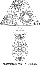 Black-and-white linear art of a table lamp with decorative ornaments