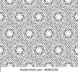 Black-and-white tones. Outline patterns of abstract flowers and petals laid out on the hexagonal pattern of creating seamless vector illustrations. 