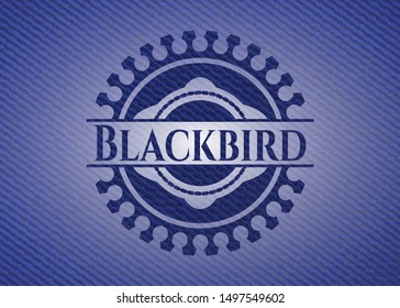 Blackbird emblem with denim high quality background. Vector Illustration. Detailed.