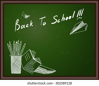 Blackboard with Back to school title and sketch drawing.