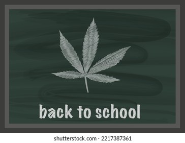 A blackboard in dark green with a cannabis flower painted on it with chalk, underneath it says "back to school.
