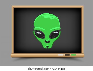 Blackboard Drawing alien with black eyes picture. Educatoin chalk drawing UFO